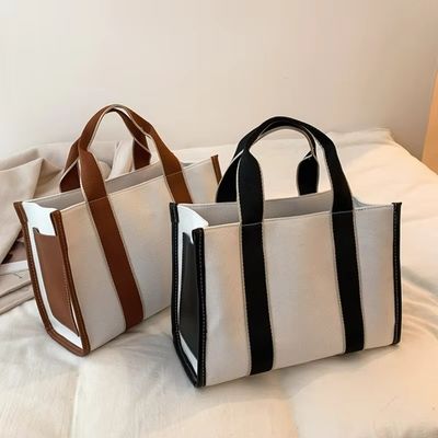 Materiais principais PU GHJ-31 Bolsas para mulheres com detecção de movimento e design listrado